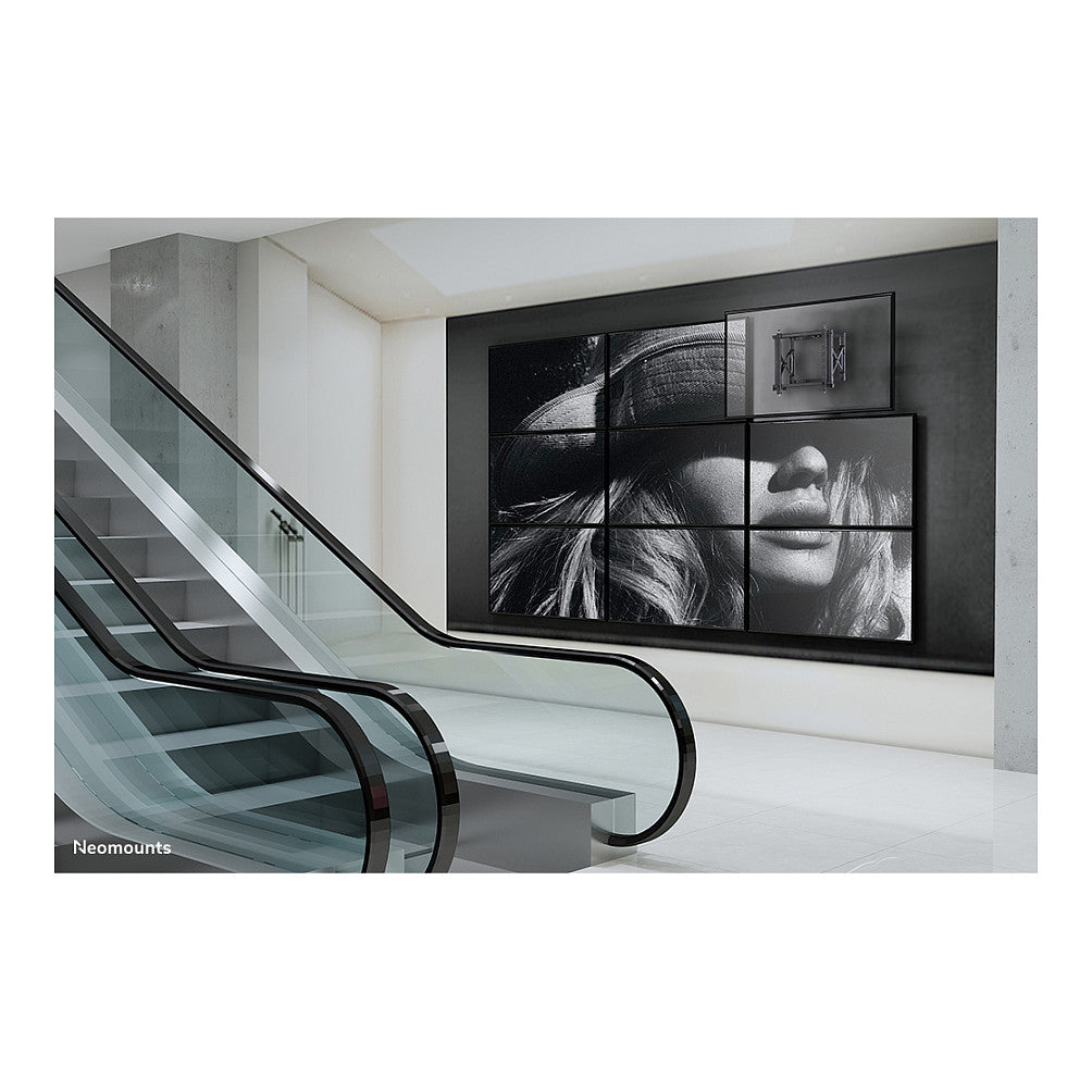 Neomounts WL95-800BL1 Push-to-Pop-Out Videowall-Wandhalterung für 42-70" Bildschirme - Schwarz